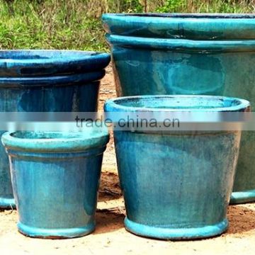old turquoise ceramic pot