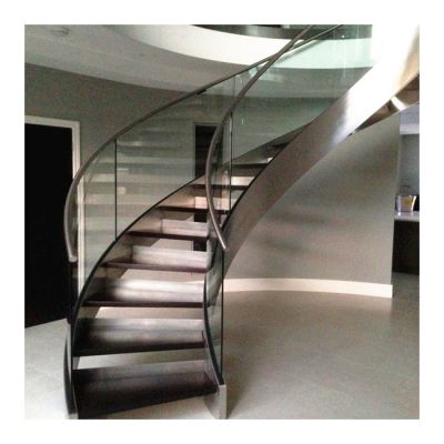 curved stainless steel staircase with glass balustrade