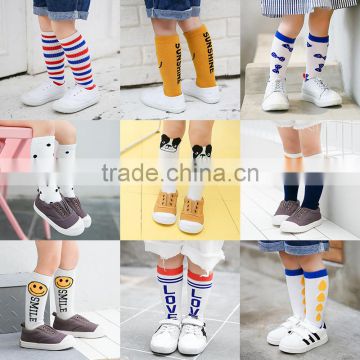 B40548A Low MOQ knee high knitted boys stockings smile stockings