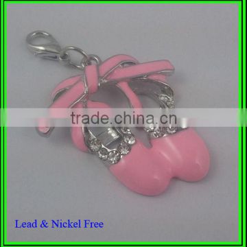 pink enamel and metal ballet shoes charm pendant