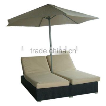 rattan beach lounge or wicker sunbed