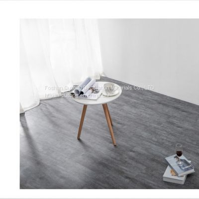 China Guangdong wholesale imitation cement stone plastic floor glue gray SPC floor tile simulation stone plastic sheet floor