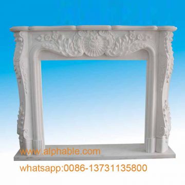 Carved marble fireplace mantels