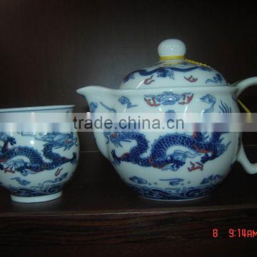 porcelain tea kettle and porcelain cup
