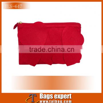Promotional cosmetic bag made in felt velvet fabric with flower patch decoration