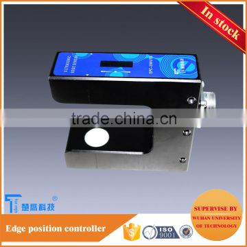 ultrasound sensor detector to detect edge in printing area