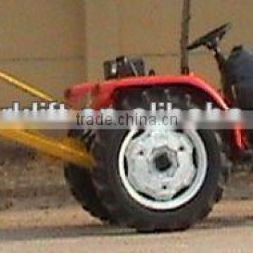 Tractor attachment for digging hole