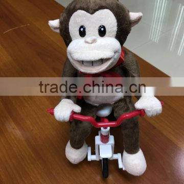 singing monkey in tricycle