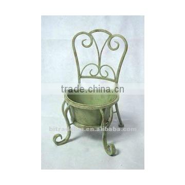 tiny chair with metal flower pot