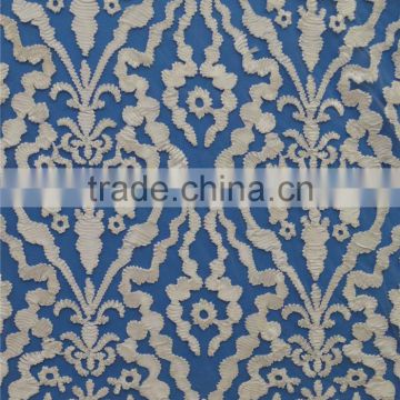 Factory cheap price embroidered on mesh dress making lace fabric