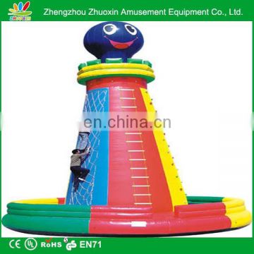 leisure,amusement hot sale inflatable climbing wall round bottom with smile face ball