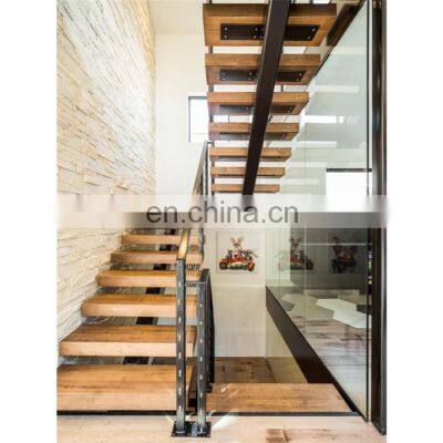 Central spine stair middle stringer staircase with wood treads