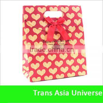 Punch handle paper shopping bags with custom logo