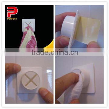 Removable self adhesive plastic towel grip