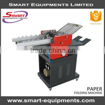 semi-automatic fed suction paper folder machine