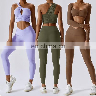 2023 Spring New Sexy 2 / 3 Piece One Shoulder Bra V Cross Waist Leggings Sports Yoga Suit Set Women Workout Activewear Outfit