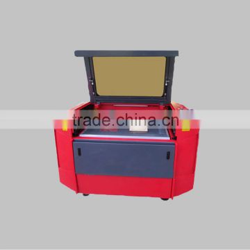 China Jinan DP+CO2 multifunctional laser engraving and cutting machine at lowest price with double laser head