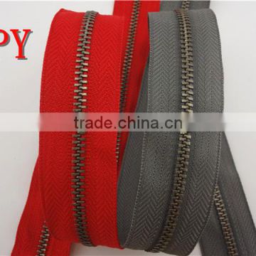 zipper with red tape