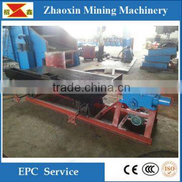 Small vibrating table for gold ore separation