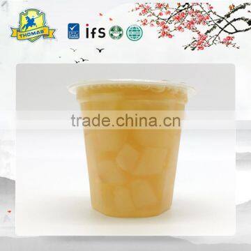 yellow peach slices in fruit cup