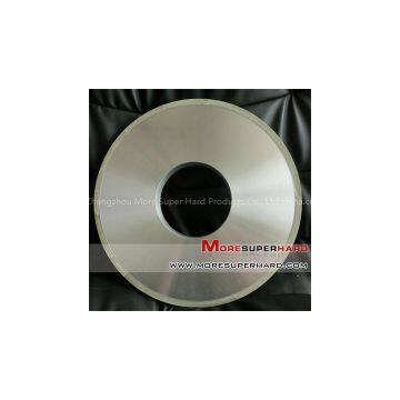 Vitrified bond diamond grinding wheel for processing PDC compact