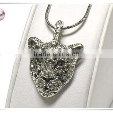 Crystal stud detailed filigree tiger pendant necklace