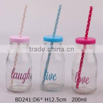 glass milk bottle with decal