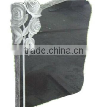 black granite headstone/monument with rose carving