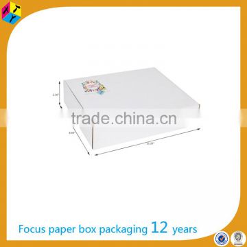 white corrugated shipping garment suit box packaging