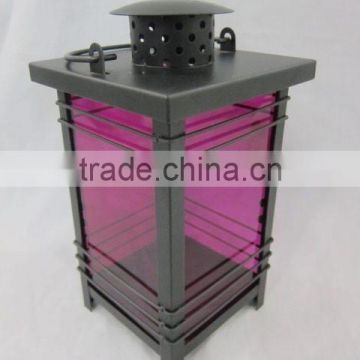 metal lantern with purple glass pieces