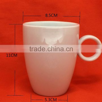 white porcelain mug with handle