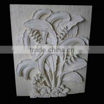 Stone Wall Relief Carving with Plant Design