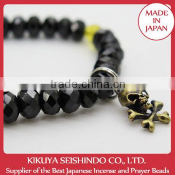 Black Spinel Bracelet with skull and crossbones and two Yellow Crystals, cool bracelet made in Japan, kikuya seishindo