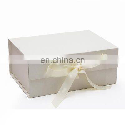 Custom ribbon style luxury ivory color foldable magnet product packing box wholesale
