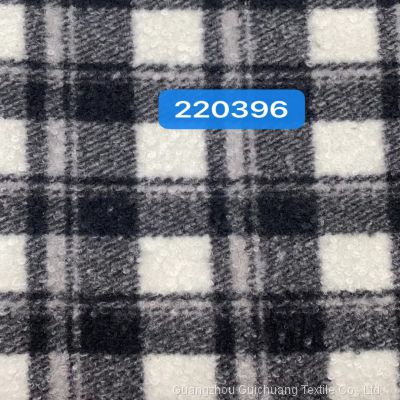Large stock supply of polyester, woolen, woolen, coarse spun, and dyed plaid fabric