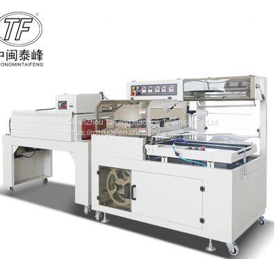 Pvc film shrink wrapping and cutting machine