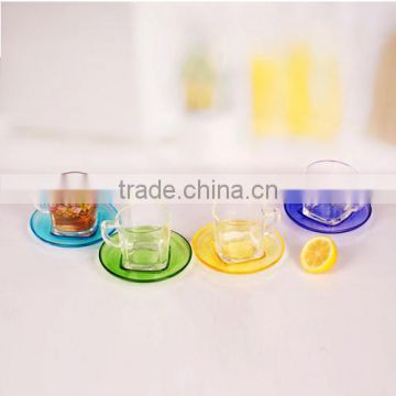 hot selling 4pcs glass cup and colored saucer set