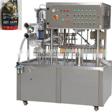 Automatic 4- nozzle stand up pouch filling and capping machine 3000bph with date printing device and spout bag feeding line