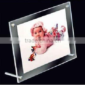 elegant transparent acrylic frame with struts for photos or pictures