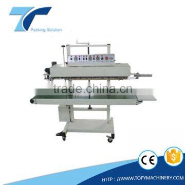 Vertical continuous band double-side heat sealing machine for thick plastic multilayer bag
