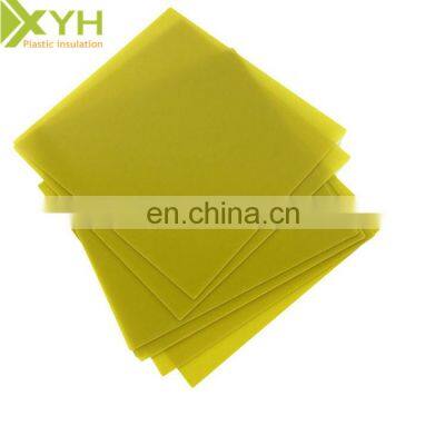 Custom machined yellow epoxy resin sheet with uniform thickness for wrapping lithium batteries
