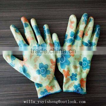 Flower printed nitrile coated polyester arthritis gloves