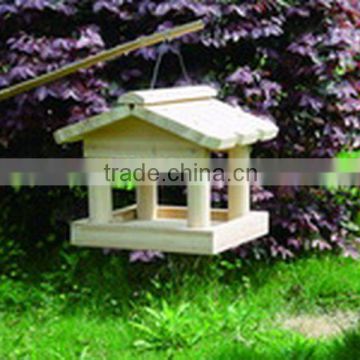 wooden bird feeder and house