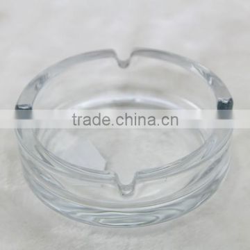 clear glass ashtray