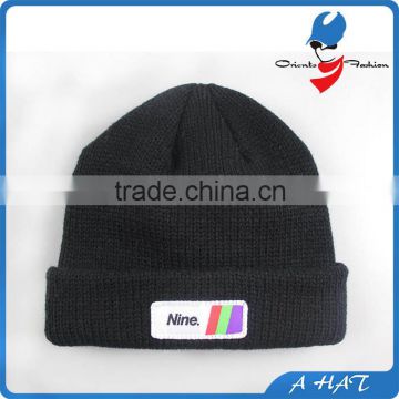 knitted beanie with marrowed woven label