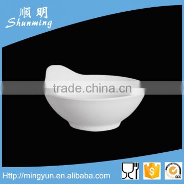 White plastic bowl with handle