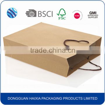 Brown kraft biodegradable paper bag with roup handle