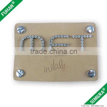 Supply newest fashionable design leather label with crystal