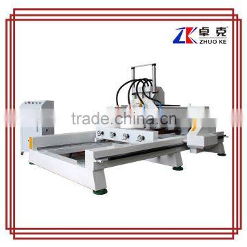 One Z axis,4 spindles,air cylinder 1325 CNC Wood cutting Machine in furniture desk chair legs