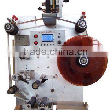 Semiautomatic round bottle labeling machine